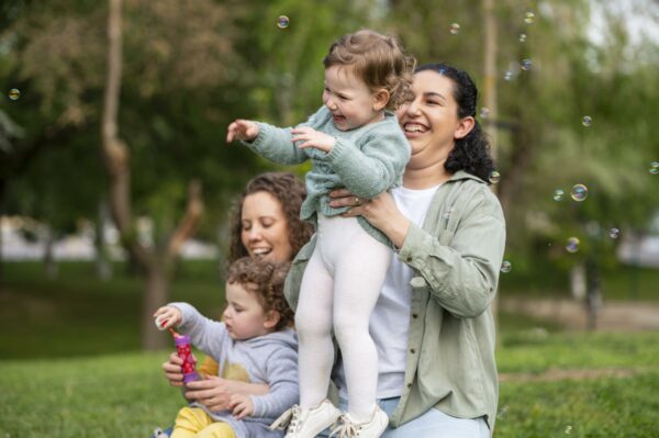 smiley-babies-outdoors-park-with-lgbt-mothers